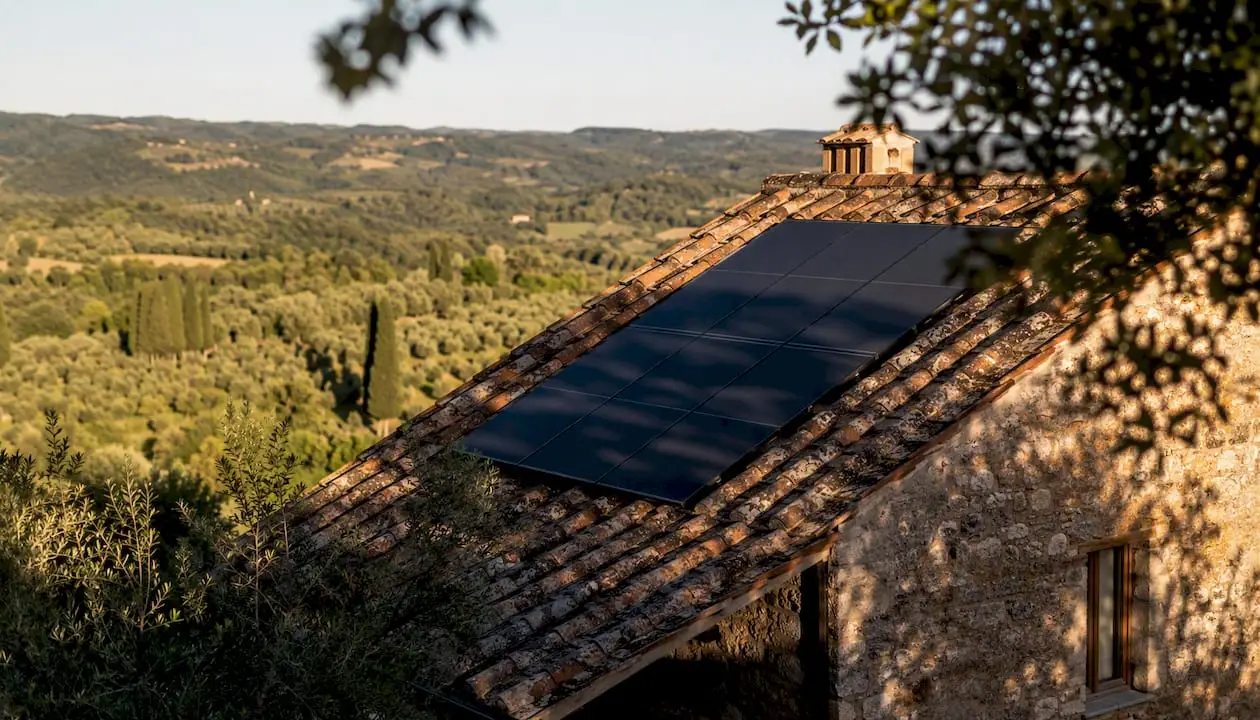 Solar panels integrated on terracotta farmhouse roof